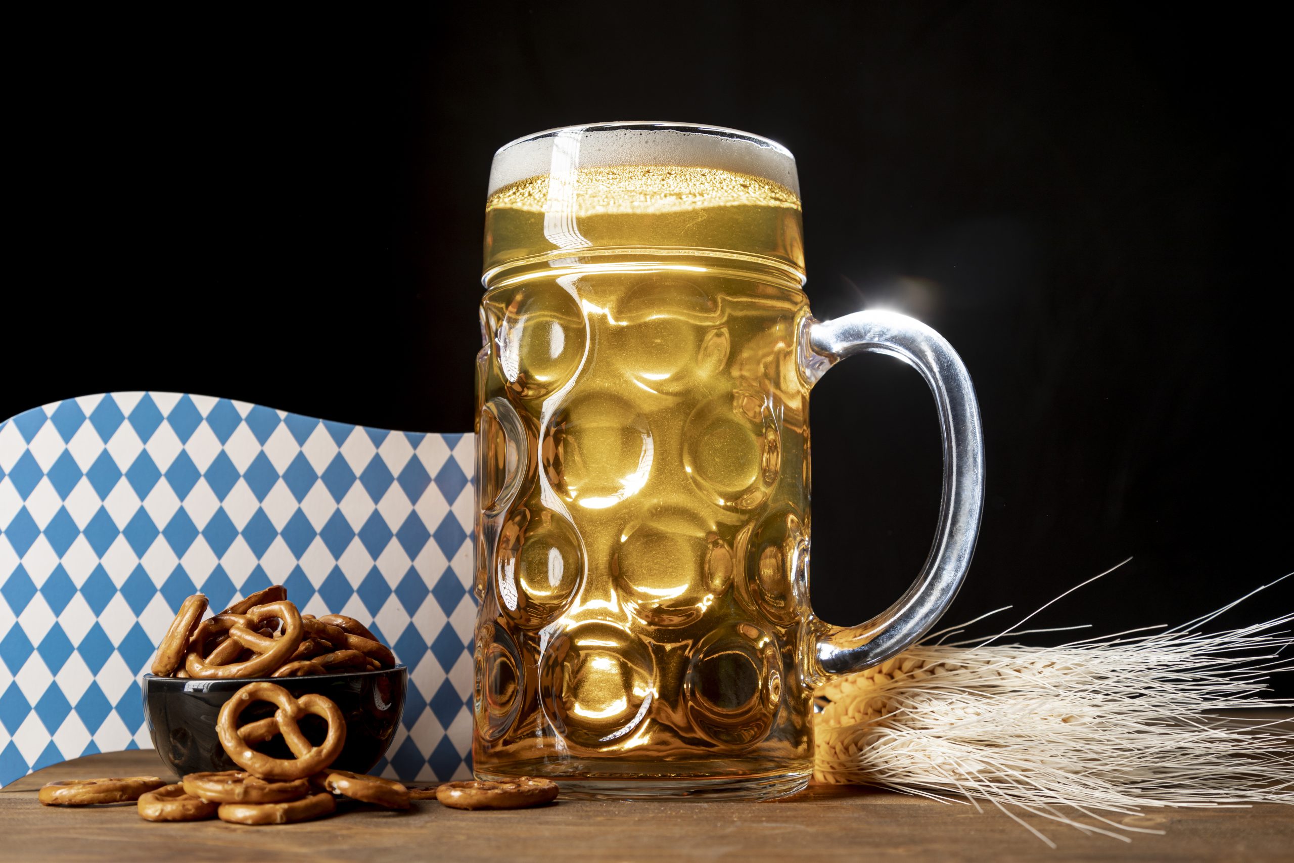 Bavarian beer on a table with pretzels