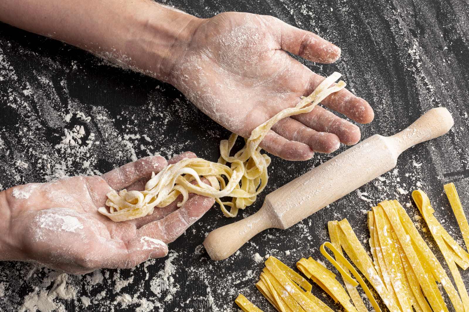 Making fresh pasta by hand with a rolling pin, Bologna cooking class
