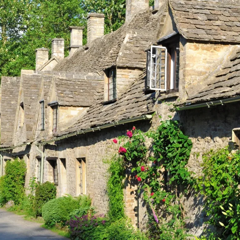 Honey-stone cottages in a Cotswolds village, England