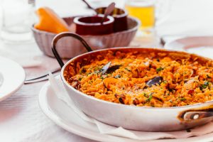 Spanish seafood paella in a pan, Madrid cooking class