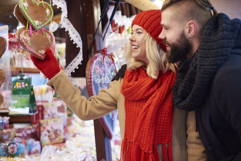 Decorated gingerbread hearts on sale at a Christmas market stall