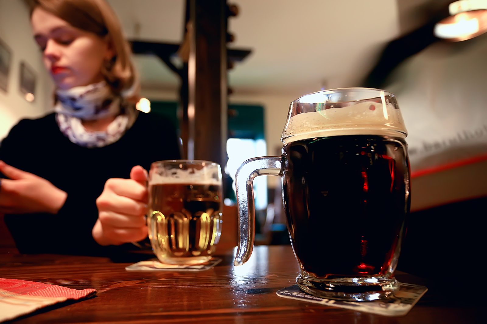 A mug of Czech beer on a pub table